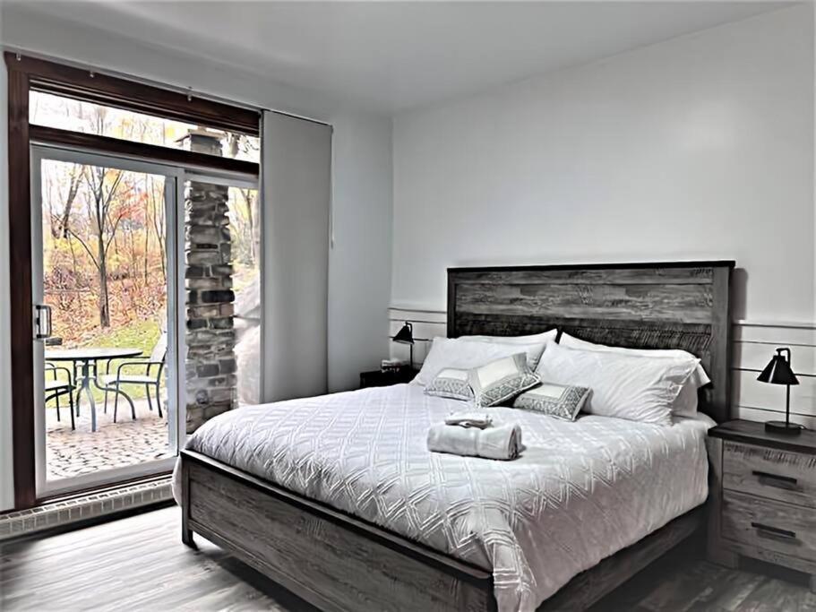 Апартаменты Tremblant Les Eaux 227-1 By Escapades Tremblant Мон-Трамблан Экстерьер фото